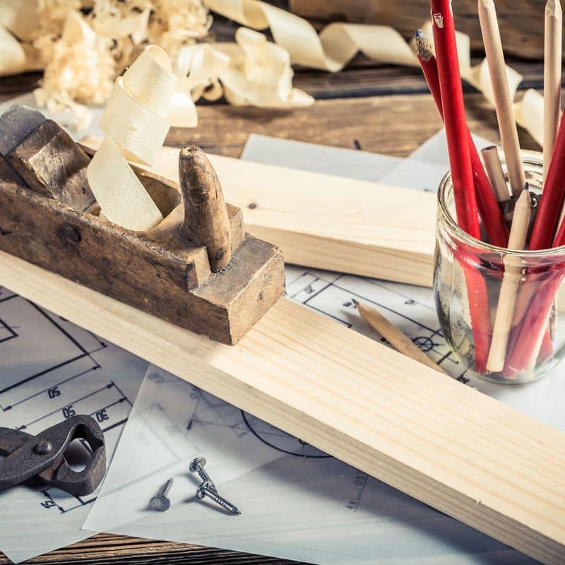 antique-carpentry-workbench-with-tools-on-old-wood-2022-04-07-22-02-07-utc